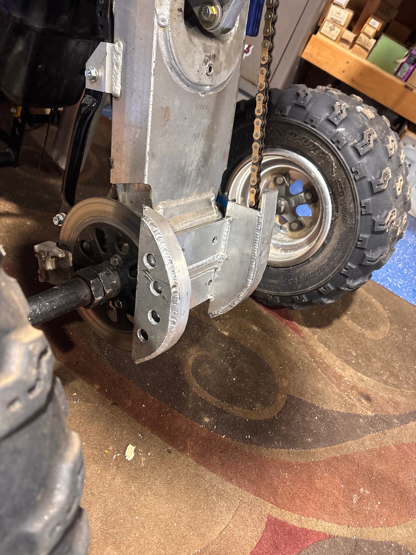 87-92 lt250r swing arm skid plate