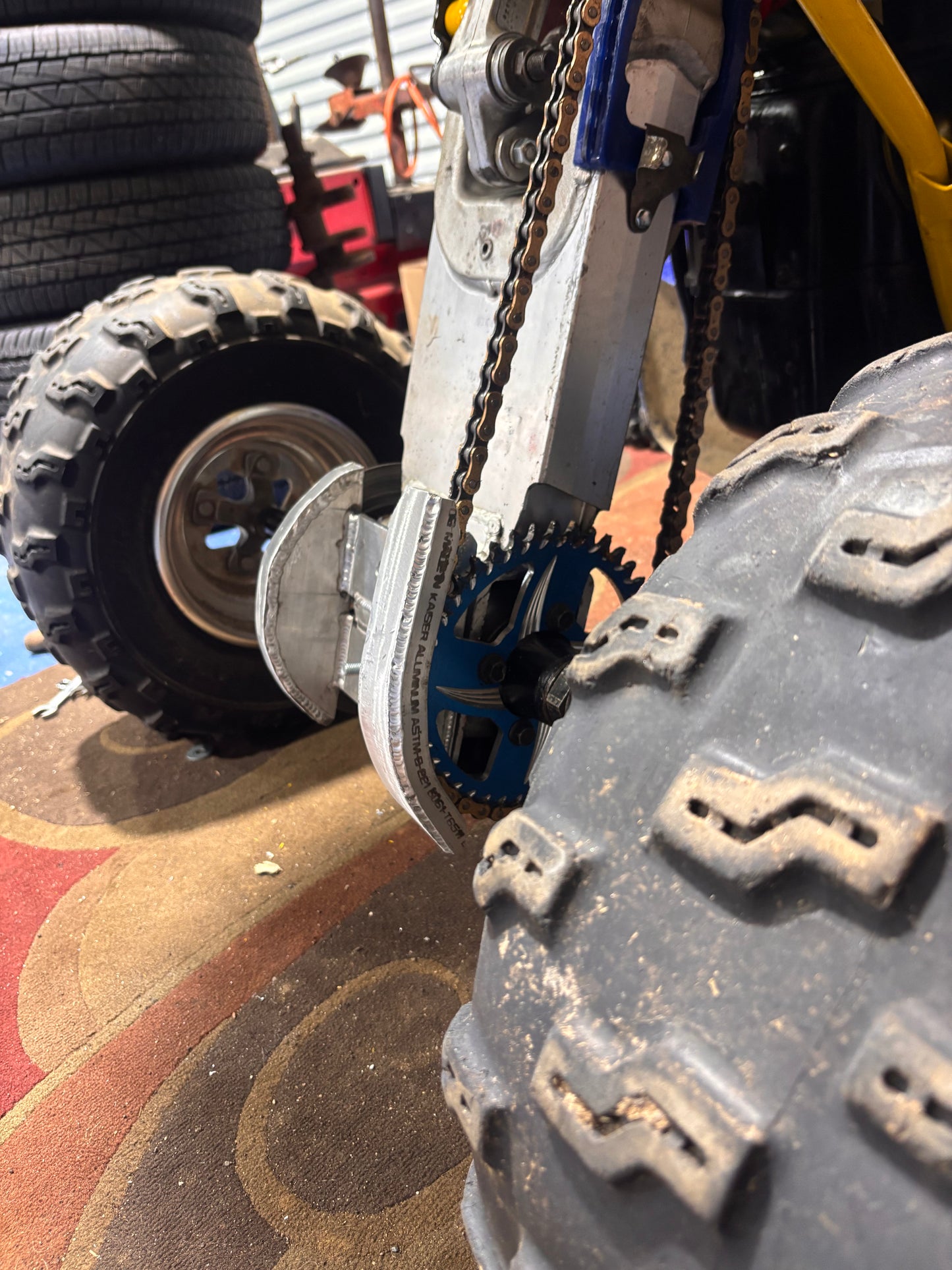 87-92 lt250r swing arm skid plate