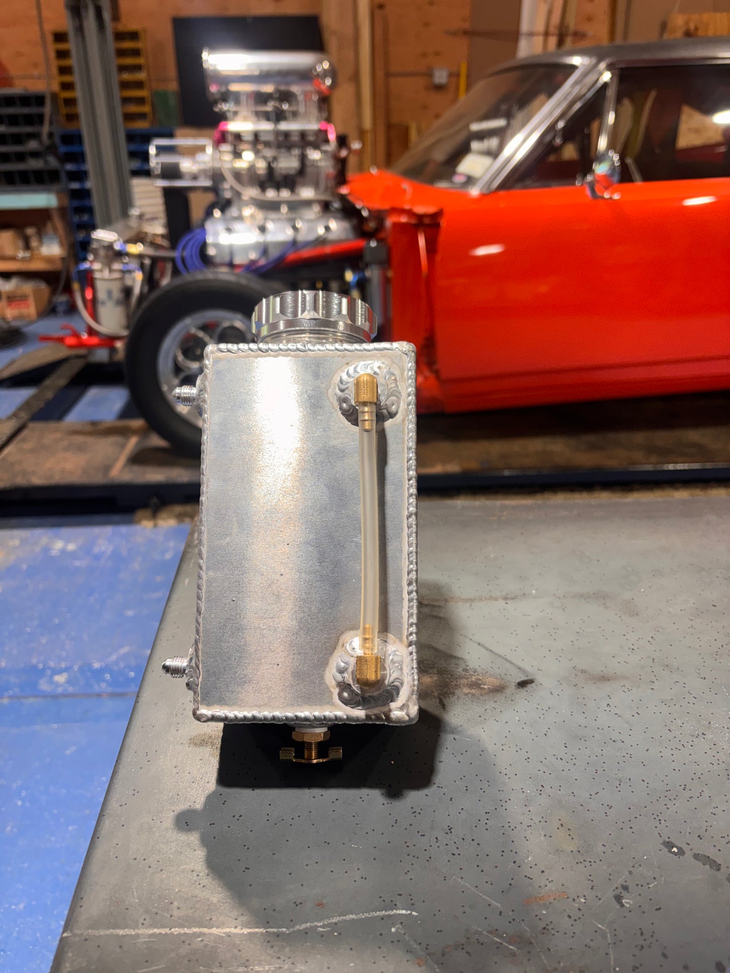 Coolant over flow tank
