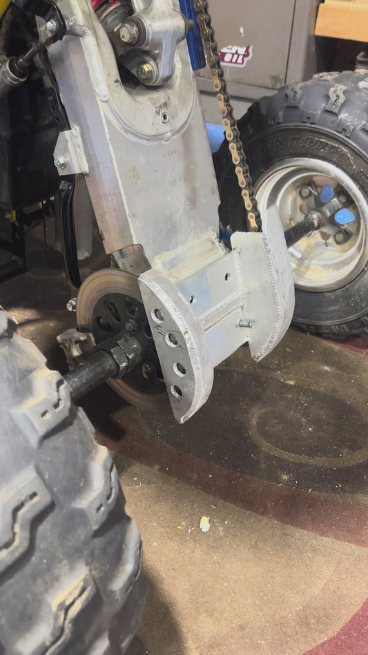 87-92 lt250r swing arm skid plate